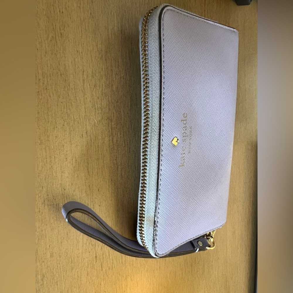 Kate Spade wallet with wrist strap. Super pretty violet/purple/lavender color.